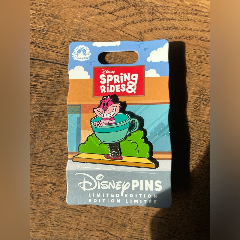 Spring Rides, Cheshire Cat on tea cups